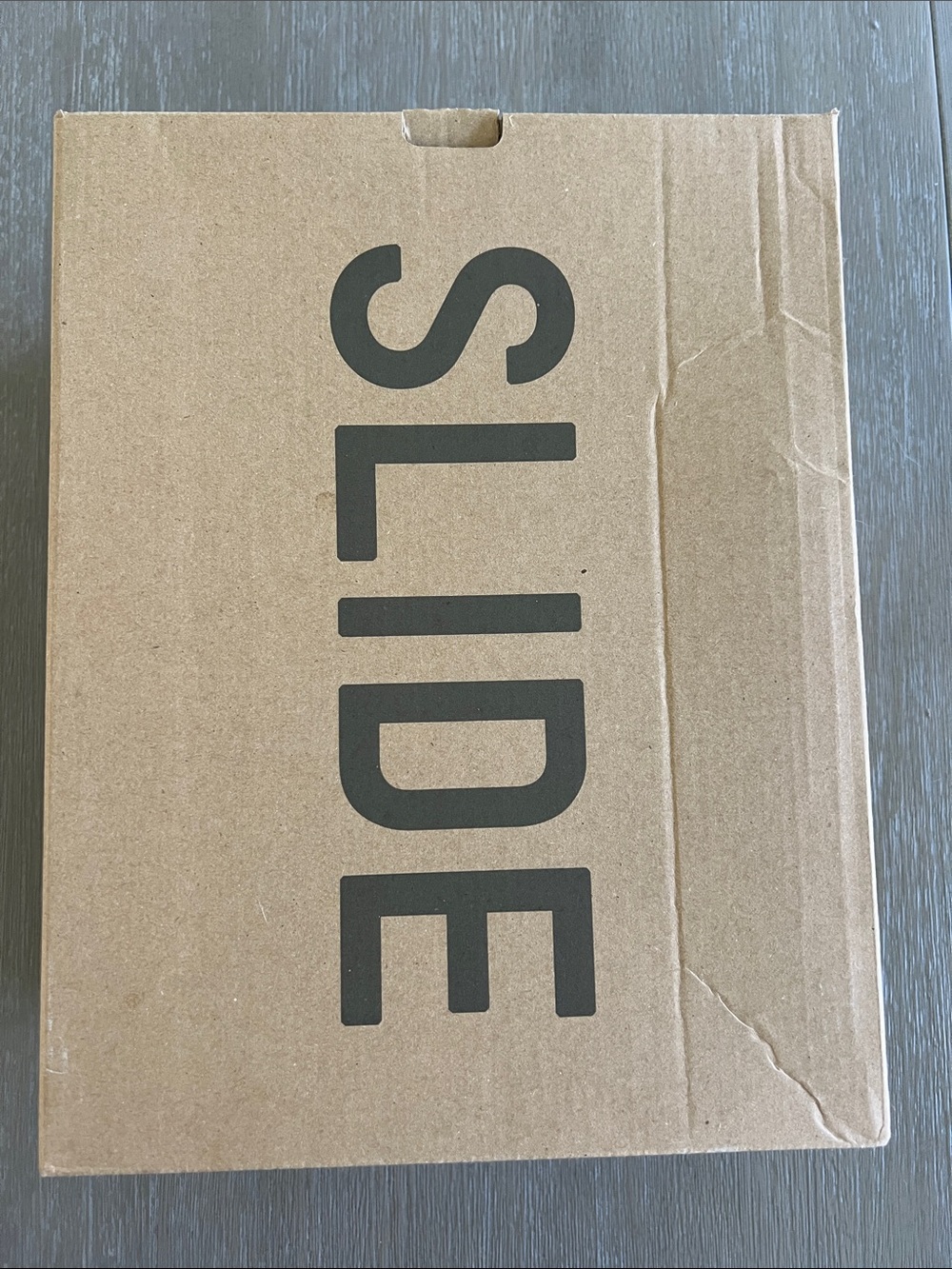 Adidas women’s YZY Slide Sandal Box in Brown and Black